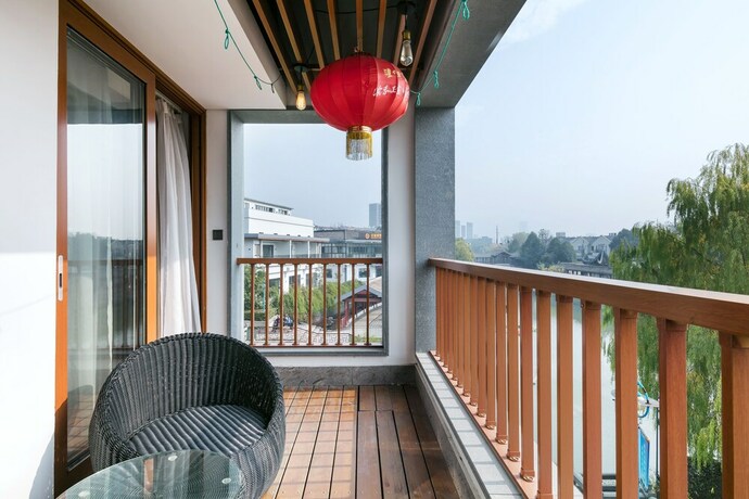 Imagen de la habitación del Hotel Floral Deqing Yingxi Riverside. Foto 24
