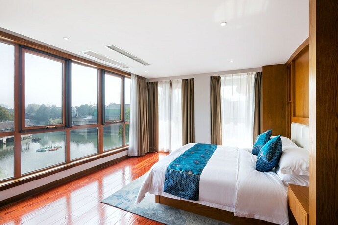 Imagen de la habitación del Hotel Floral Deqing Yingxi Riverside. Foto 25
