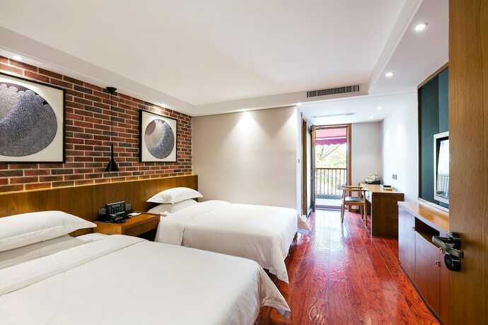 Imagen de la habitación del Hotel Floral Deqing Yingxi Riverside. Foto 26