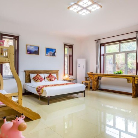 Imagen de la habitación del Hotel Floral He Ping He Yuan Jixian. Foto 2