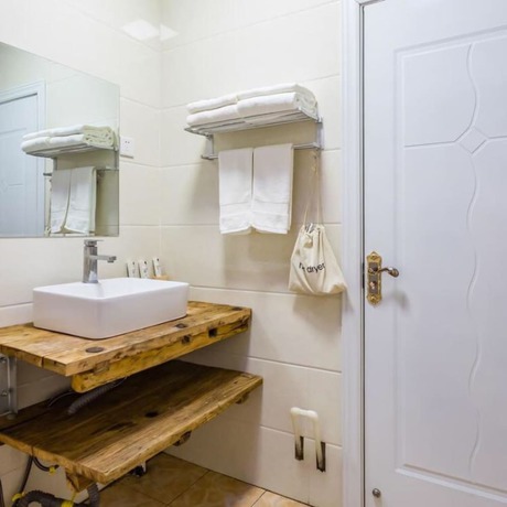 Imagen de la habitación del Hotel Floral He Ping He Yuan Jixian. Foto 3