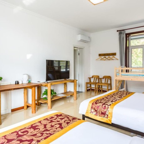 Imagen de la habitación del Hotel Floral He Ping He Yuan Jixian. Foto 4