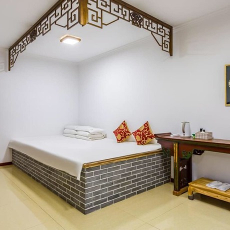 Imagen de la habitación del Hotel Floral He Ping He Yuan Jixian. Foto 9