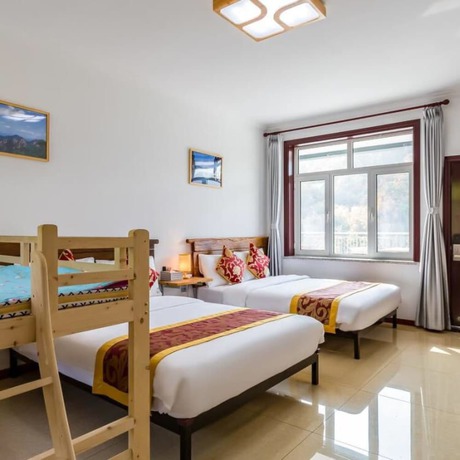 Imagen de la habitación del Hotel Floral He Ping He Yuan Jixian. Foto 13