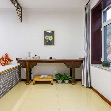 Imagen de la habitación del Hotel Floral He Ping He Yuan Jixian. Foto 19