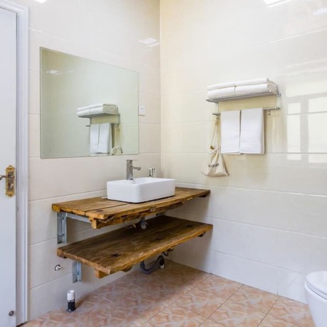 Imagen de la habitación del Hotel Floral He Ping He Yuan Jixian. Foto 20