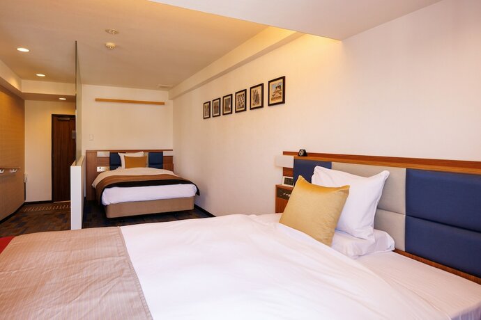 Imagen de la habitación del Hotel Floral Higashishinsaibashi. Foto 13