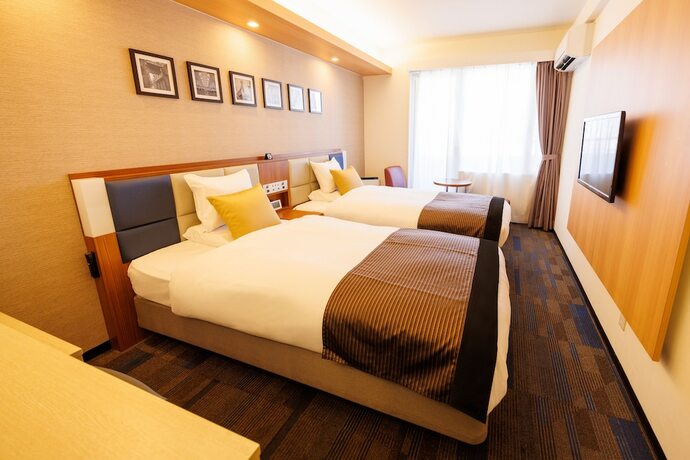 Imagen de la habitación del Hotel Floral Higashishinsaibashi. Foto 15
