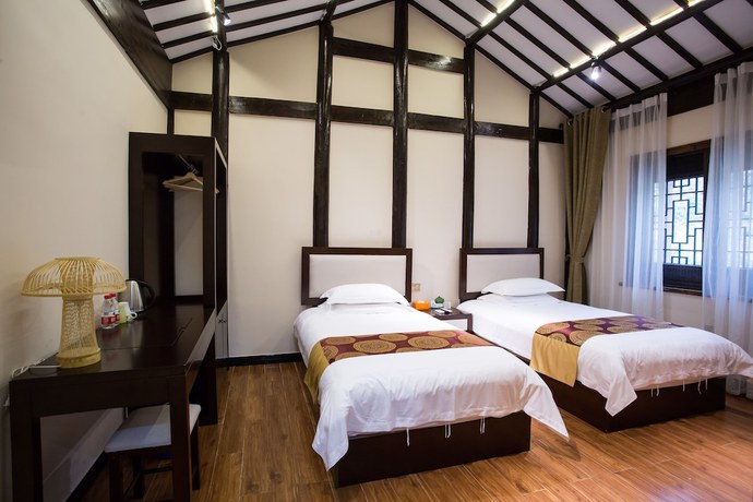 Imagen de la habitación del Hotel Floral Hotel Anji Shuyiquanzhen Valley. Foto 15