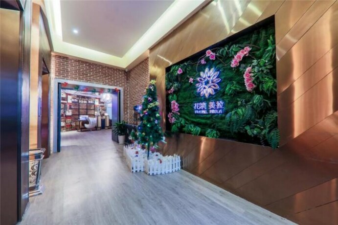 Imagen de los interiores del Hotel Floral Hotel Chongqing Meila. Foto 18