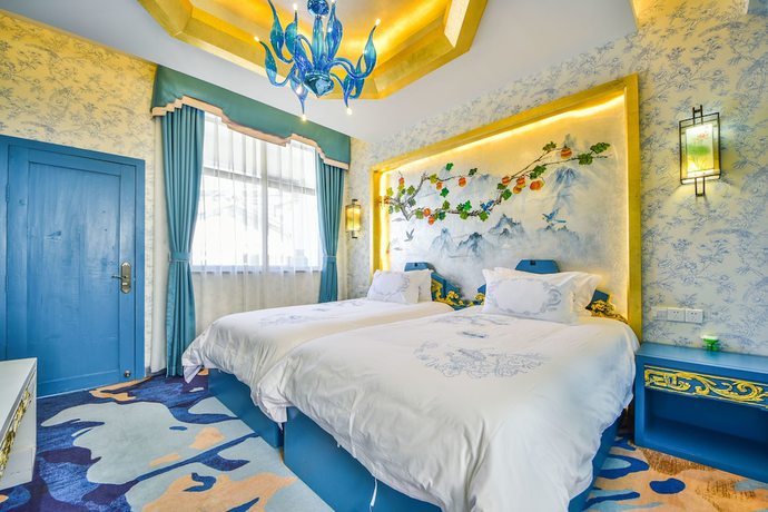 Imagen de la habitación del Hotel Floral Hotel Dali New Zhaoli. Foto 11