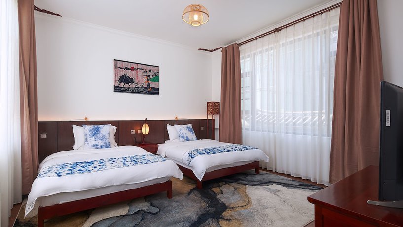 Imagen de la habitación del Hotel Floral Hotel Dali Yixin Yard. Foto 10