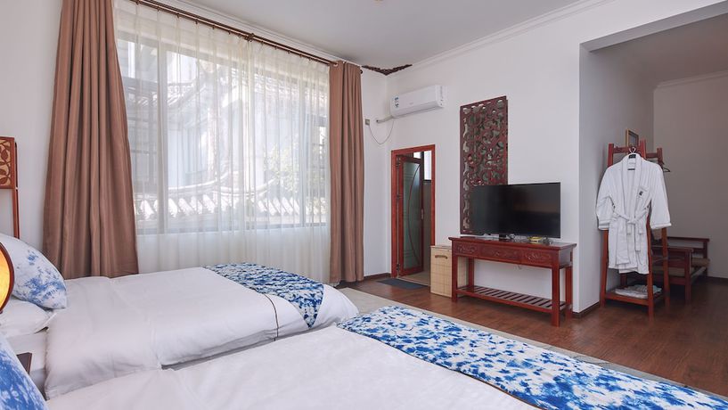 Imagen de la habitación del Hotel Floral Hotel Dali Yixin Yard. Foto 13