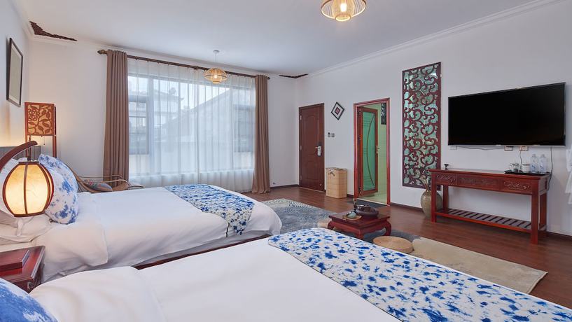 Imagen de la habitación del Hotel Floral Hotel Dali Yixin Yard. Foto 14