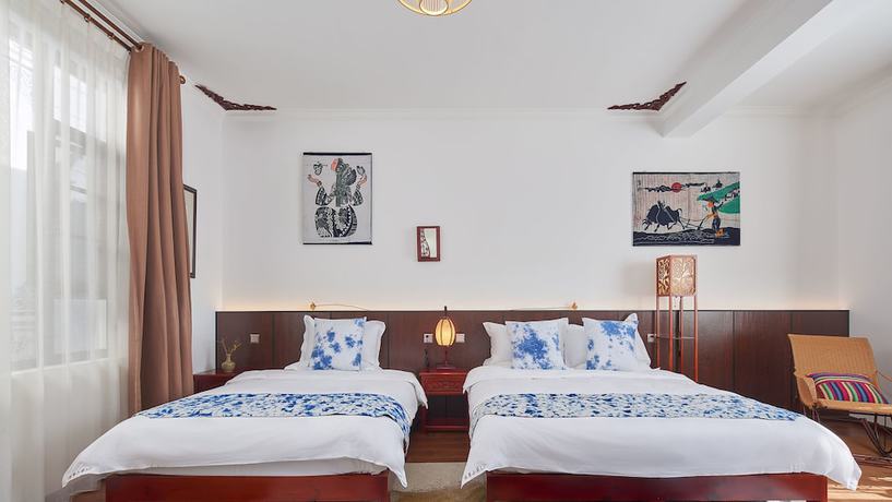 Imagen de la habitación del Hotel Floral Hotel Dali Yixin Yard. Foto 16