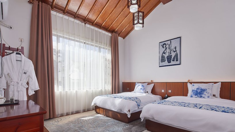Imagen de la habitación del Hotel Floral Hotel Dali Yixin Yard. Foto 19