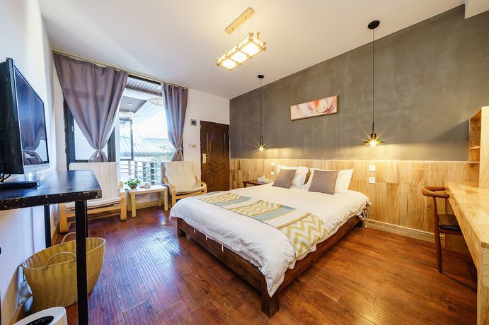 Imagen de la habitación del Hotel Floral Hotel Dali Yunsheng. Foto 10