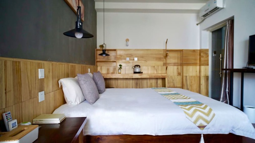 Imagen de la habitación del Hotel Floral Hotel Dali Yunsheng. Foto 11