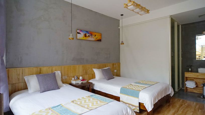 Imagen de la habitación del Hotel Floral Hotel Dali Yunsheng. Foto 16