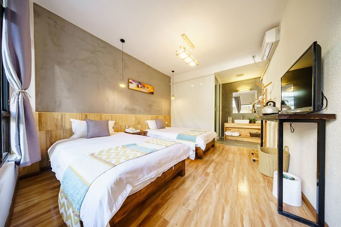 Imagen de la habitación del Hotel Floral Hotel Dali Yunsheng. Foto 17