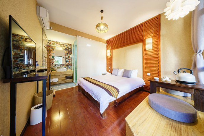 Imagen de la habitación del Hotel Floral Hotel Dali Yunsheng. Foto 18