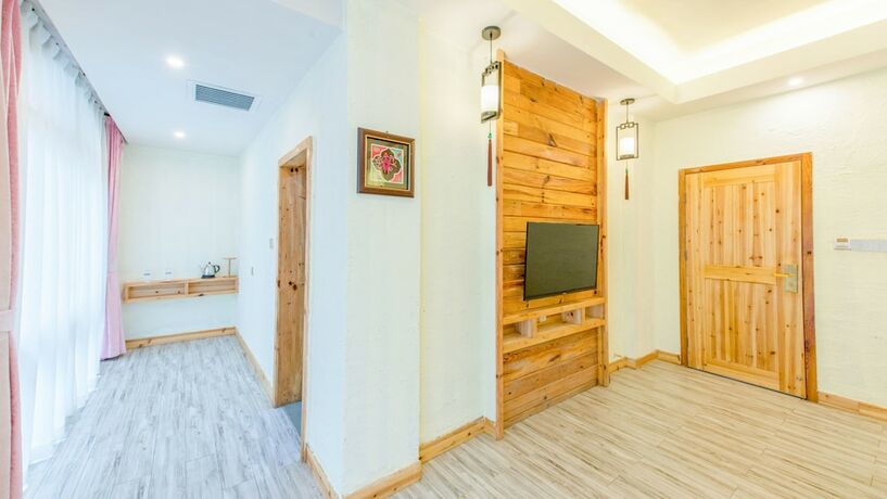 Imagen de la habitación del Hotel Floral Hotel Fenghuang Huercaowu. Foto 2