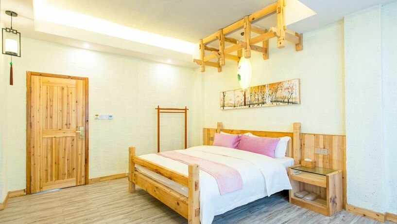 Imagen de la habitación del Hotel Floral Hotel Fenghuang Huercaowu. Foto 3