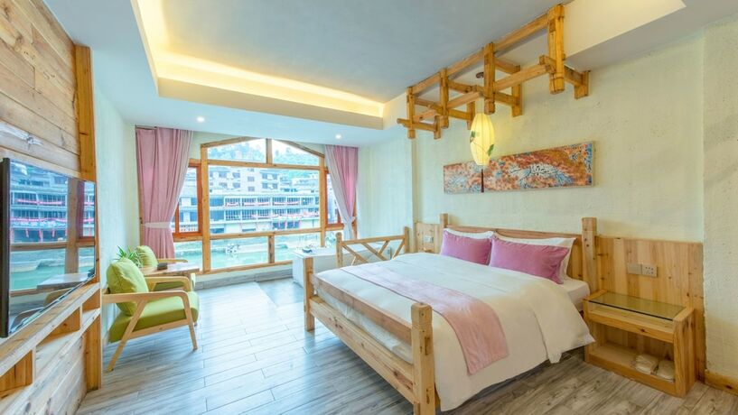 Imagen de la habitación del Hotel Floral Hotel Fenghuang Huercaowu. Foto 6