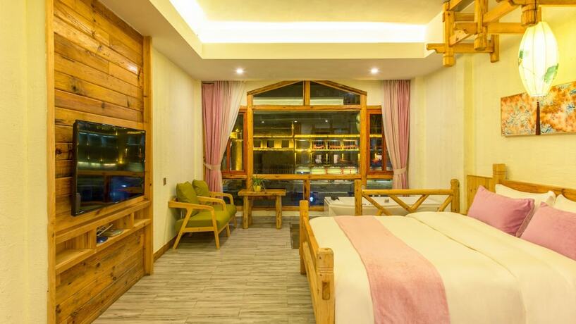 Imagen de la habitación del Hotel Floral Hotel Fenghuang Huercaowu. Foto 7