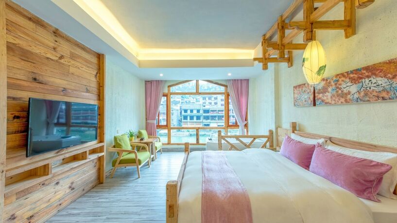 Imagen de la habitación del Hotel Floral Hotel Fenghuang Huercaowu. Foto 14