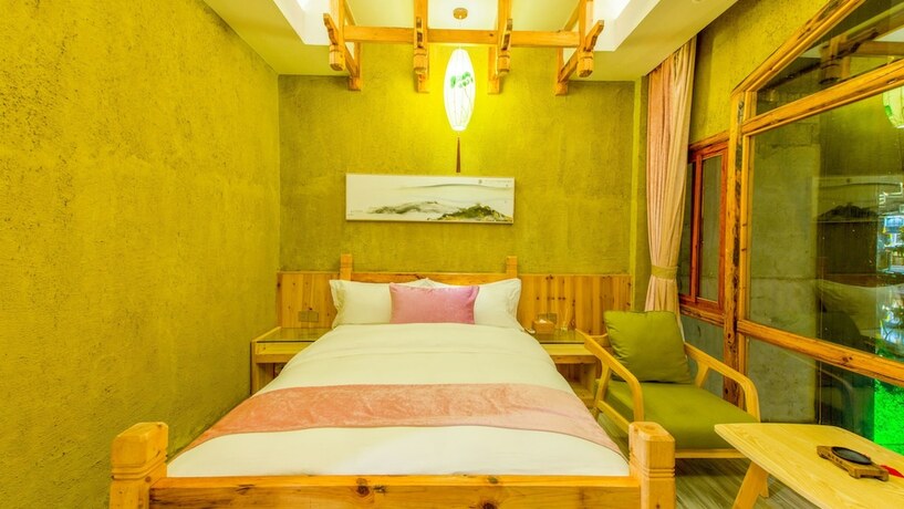 Imagen de la habitación del Hotel Floral Hotel Fenghuang Huercaowu. Foto 16