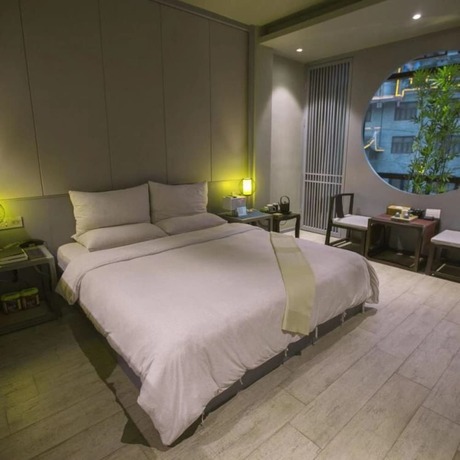 Imagen de la habitación del Hotel Floral Hotel Fenghuang Molan Riverview. Foto 2