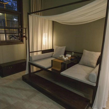 Imagen de la habitación del Hotel Floral Hotel Fenghuang Molan Riverview. Foto 7