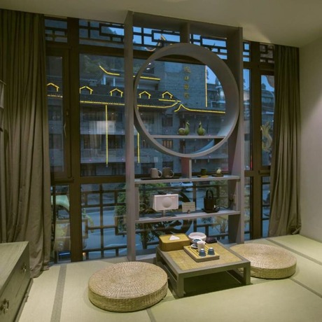 Imagen de la habitación del Hotel Floral Hotel Fenghuang Molan Riverview. Foto 8