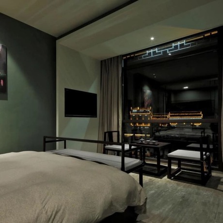 Imagen de la habitación del Hotel Floral Hotel Fenghuang Molan Riverview. Foto 9