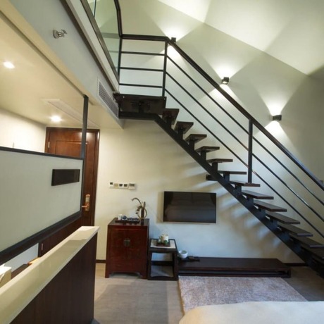 Imagen de la habitación del Hotel Floral Hotel Fenghuang Molan Riverview. Foto 11