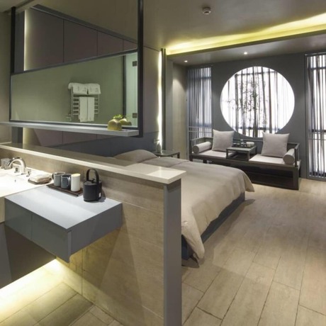 Imagen de la habitación del Hotel Floral Hotel Fenghuang Molan Riverview. Foto 16