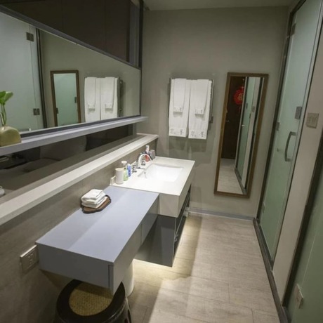 Imagen de la habitación del Hotel Floral Hotel Fenghuang Molan Riverview. Foto 17