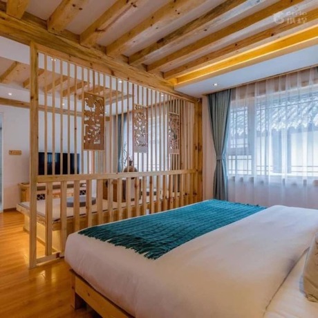 Imagen de la habitación del Hotel Floral Hotel Flower Fence Lijiang. Foto 2