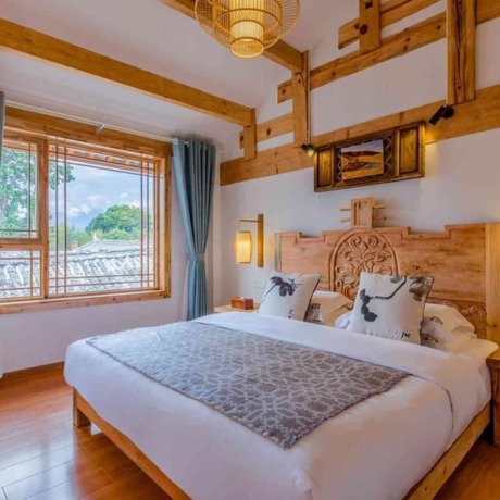 Imagen de la habitación del Hotel Floral Hotel Flower Fence Lijiang. Foto 10