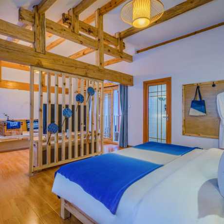 Imagen de la habitación del Hotel Floral Hotel Flower Fence Lijiang. Foto 16