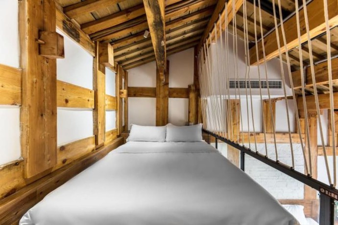 Imagen de la habitación del Hotel Floral Hotel Langzhong Pangmen College. Foto 2