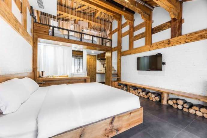 Imagen de la habitación del Hotel Floral Hotel Langzhong Pangmen College. Foto 11