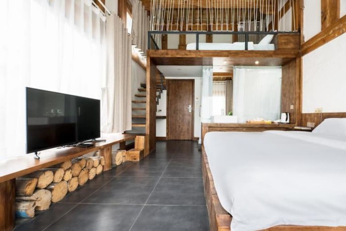 Imagen de la habitación del Hotel Floral Hotel Langzhong Pangmen College. Foto 12