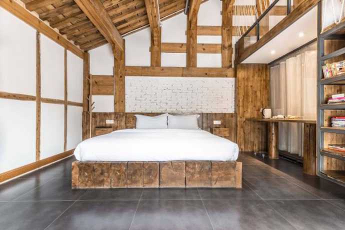 Imagen de la habitación del Hotel Floral Hotel Langzhong Pangmen College. Foto 19