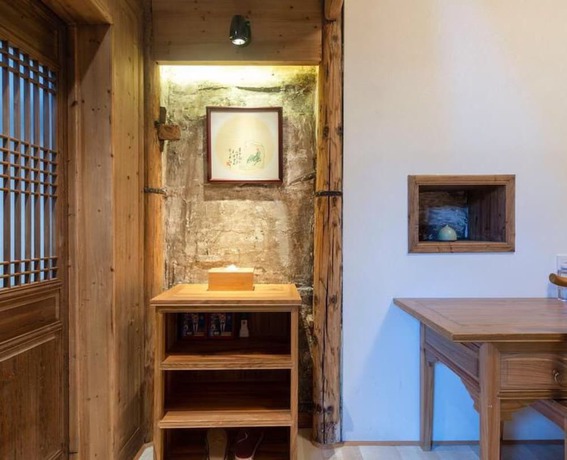 Imagen de la habitación del Hotel Floral Hotel Leisurely Life Wuyuan. Foto 5