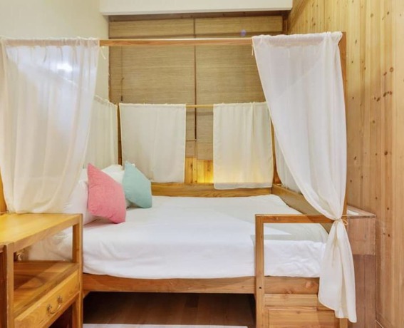 Imagen de la habitación del Hotel Floral Hotel Leisurely Life Wuyuan. Foto 7