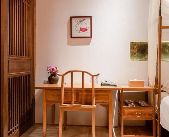 Imagen de la habitación del Hotel Floral Hotel Leisurely Life Wuyuan. Foto 10