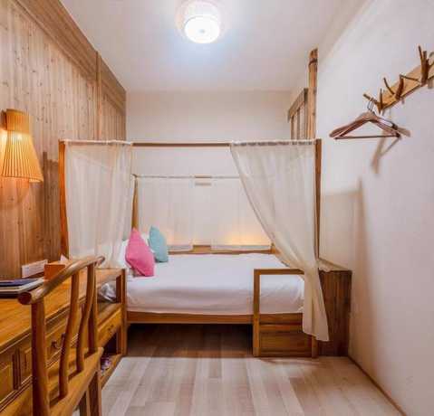 Imagen de la habitación del Hotel Floral Hotel Leisurely Life Wuyuan. Foto 12