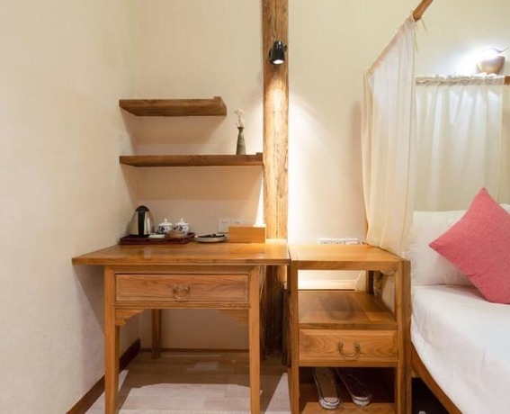 Imagen de la habitación del Hotel Floral Hotel Leisurely Life Wuyuan. Foto 13